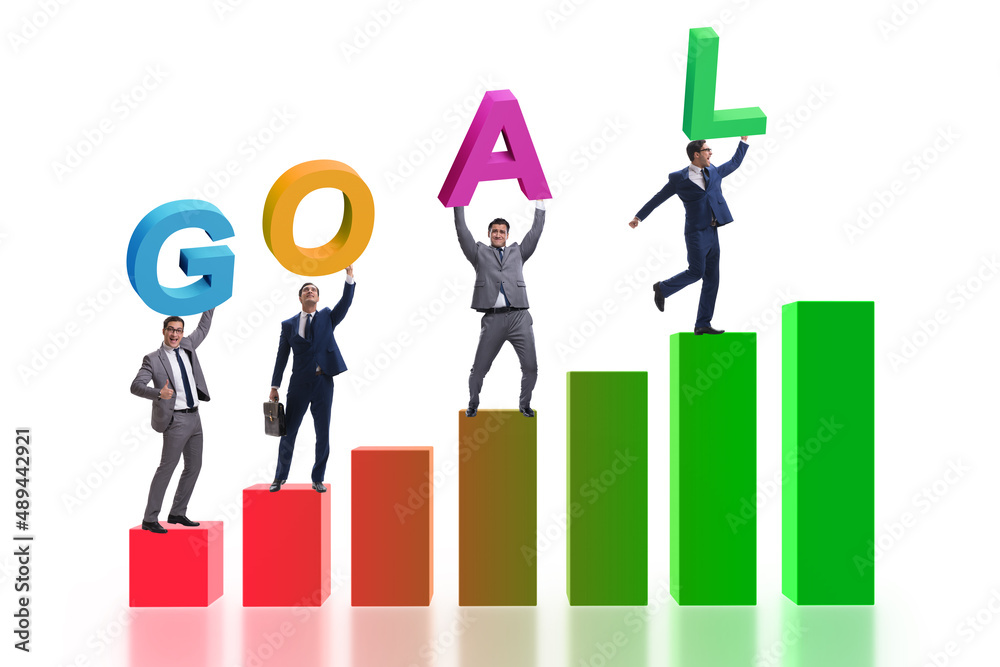 Businessman in goal concept carrying letters Businessman in goal concept carrying letters