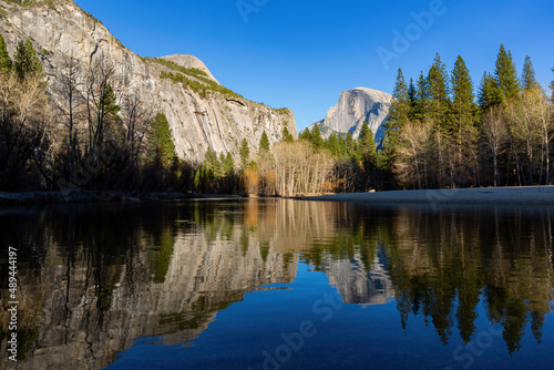 Fototapeta Naklejka Na Ścianę i Meble -  Sunny view of the half dome and merced river landscape of Yosemite National Park