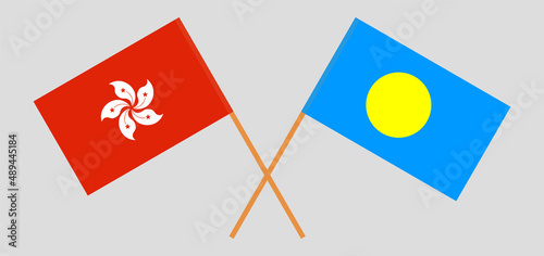 Crossed flags of Hong Kong and Palau. Official colors. Correct proportion