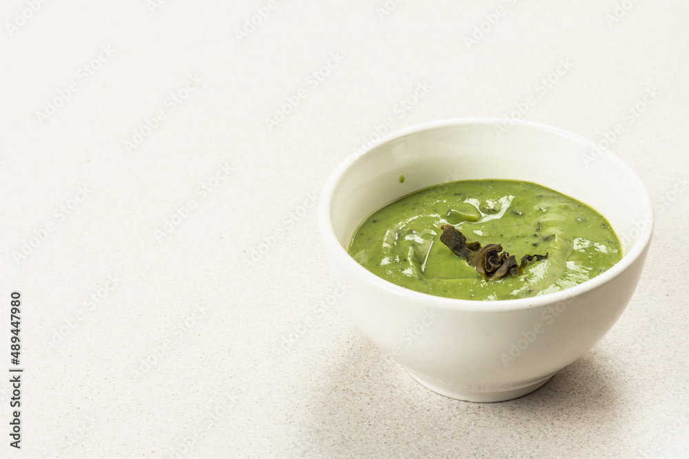 Kelp puree isolated on white background. Healthy superfood from oceanic seaweed Kelp puree isolated on white background. Healthy superfood from oceanic seaweed