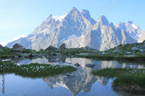 Amazing reflections in lake Tuckett looking Mont Pelvoux in the French alps 