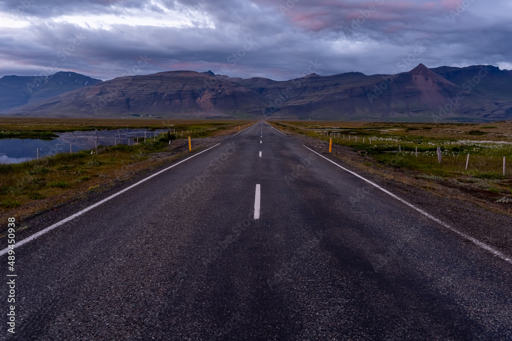 Beautiful aerial view of the great lonely highways crossing between mountains and nature, in Iceland Beautiful aerial view of the great lonely highways crossing between mountains and nature, in Iceland