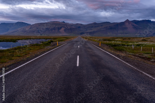 Beautiful aerial view of the great lonely highways crossing between mountains and nature, in Iceland 