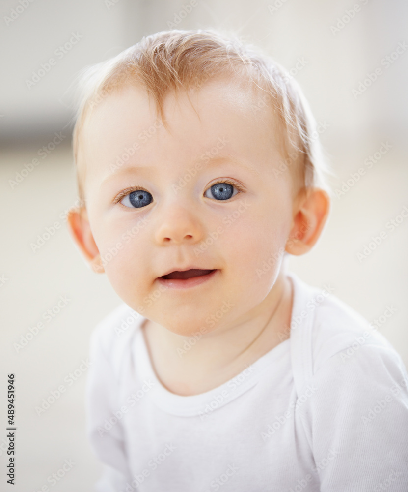 Who could say no to these eyes. Portrait of an adorable baby boy.