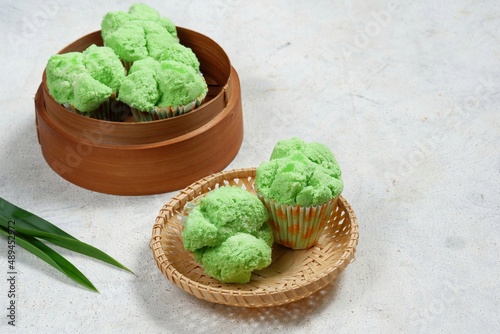 Bolu Kukus or steamed cupcake, an Indonesian traditional sweet snack.very fluffy and soft texture. It is steamed until cracks on top.