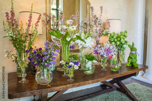 Table of spring flowers in vases