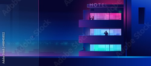 Hotel glowing at night with bright neon illumination background