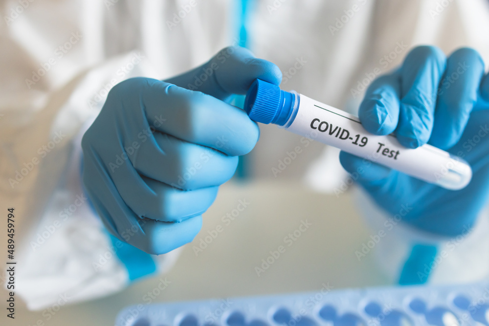 Process of coronavirus PCR antigen testing examination by nurse medic in laboratory lab, COVID-19 swab collection kit, test tube for taking OP NP patient specimen sample, patient receiving test Process of coronavirus PCR antigen testing examination by nurse medic in laboratory lab, COVID-19 swab collection kit, test tube for taking OP NP patient specimen sample, patient receiving test