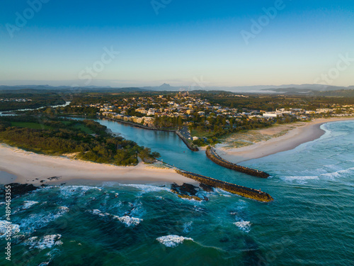 Cudgen Creek mouth at Kingscliff from a drone showing the new Tweed Valley Hospital emerging on the hill. Mt Warning sitting on the horizon
