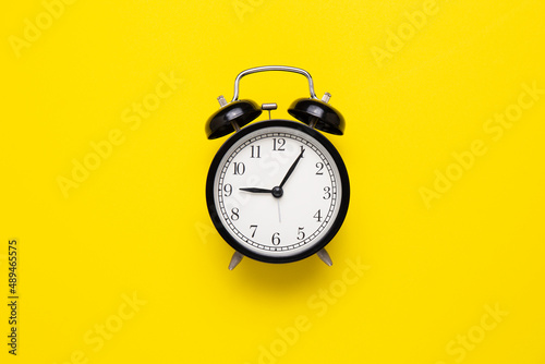  alarm clock on the yellow background