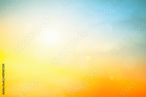 Fototapeta Naklejka Na Ścianę i Meble -  Relaxing outdoors vacation landscape concept: Abstract blurred sunlight beach colorful blurred bokeh background with autumn sunset sky calm.