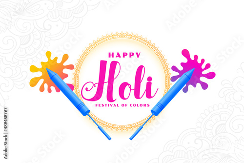 holi colors and pichkari greeting design photo