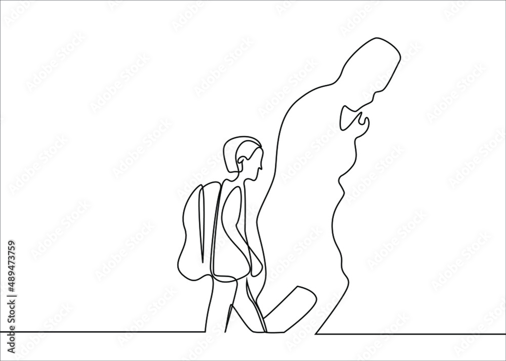 a little student walks daydreaming and thinking and the silhouette of a commander is reflected on the wall a little student walks daydreaming and thinking and the silhouette of a commander is reflected on the wall