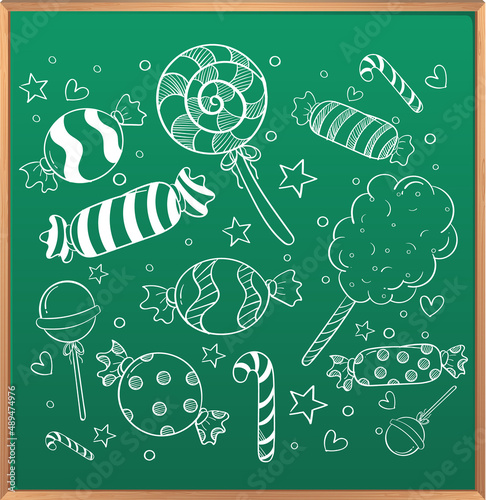 Hand drawn doodle icons on chalkboard