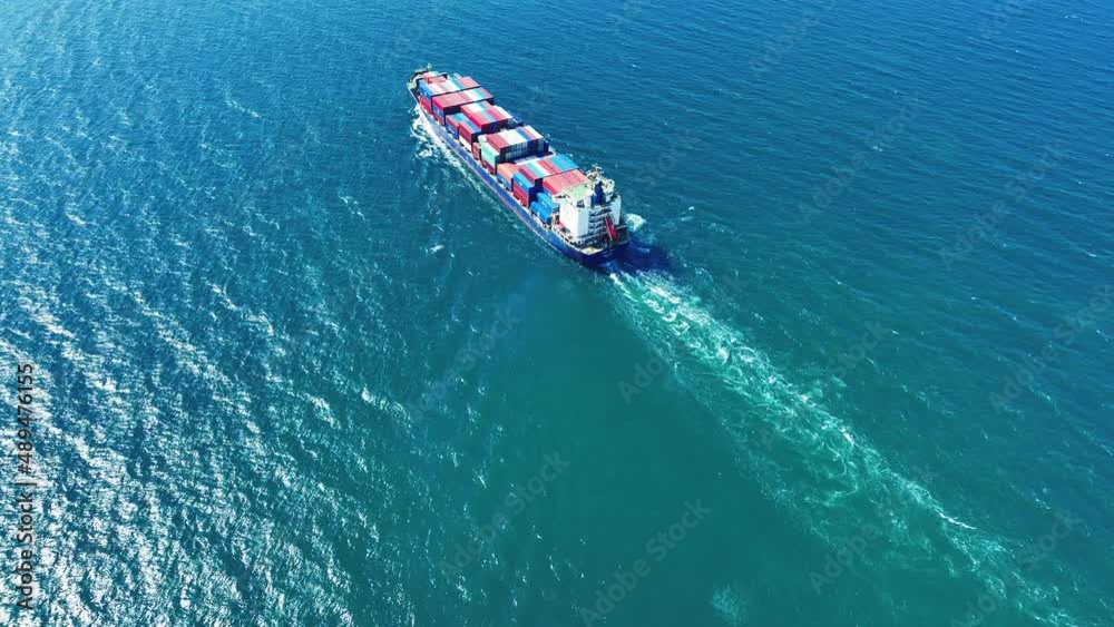 Stern of large cargo ship running in the ocean blue sea , container ship carry cargo box concept logistic transportation service Stern of large cargo ship running in the ocean blue sea , container ship carry cargo box concept logistic transportation service