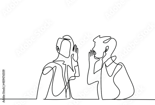a man gossips saying something to a woman in a whisper