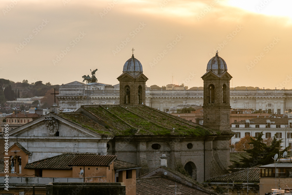 Panoramic view from the Pinicio viewpoint of Rome Italy, in the middle of an intense orange sunset