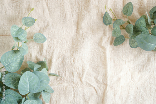 Wallpaper Mural top view in flat lay style of table setting mock up with linen cloth and decor green branches eucalyptus with copy space. background for wallpaper, design, lettering, cards, blogs, banner or poster. Torontodigital.ca