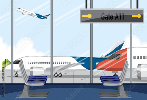 Empty airport terminal with airplane outside