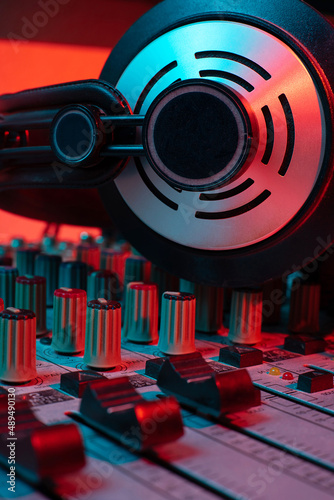 sound mixer and headphones. radio DJ sound engeneering