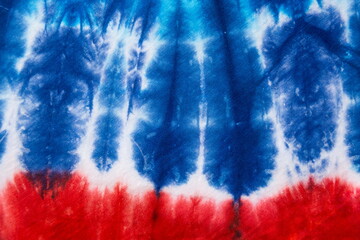 Abstract tie dye background, blue and red color