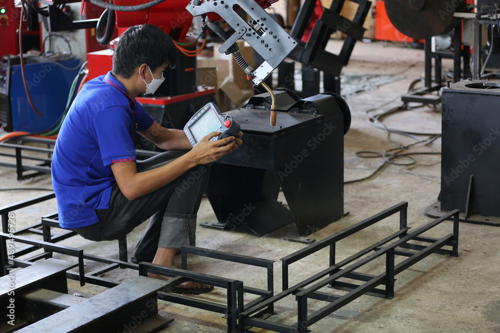 Factory Engineer Operating machines in industry factory. Factory Engineer Operating machines in industry factory.
