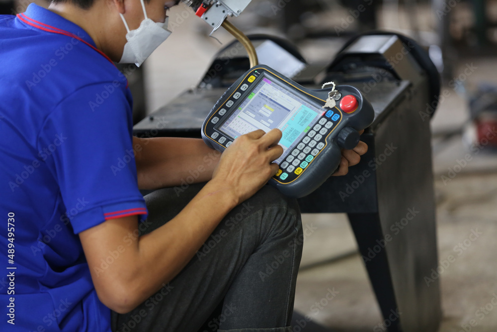 Factory Engineer Operating machines in industry factory. Factory Engineer Operating machines in industry factory.