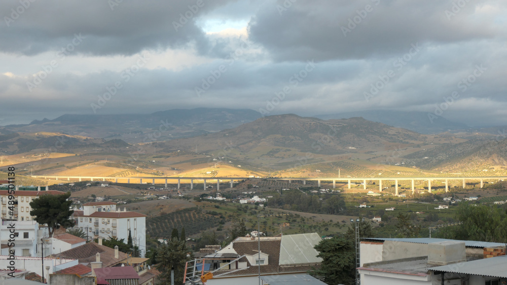 Sun and rain clouds over Guadalhorce valley
