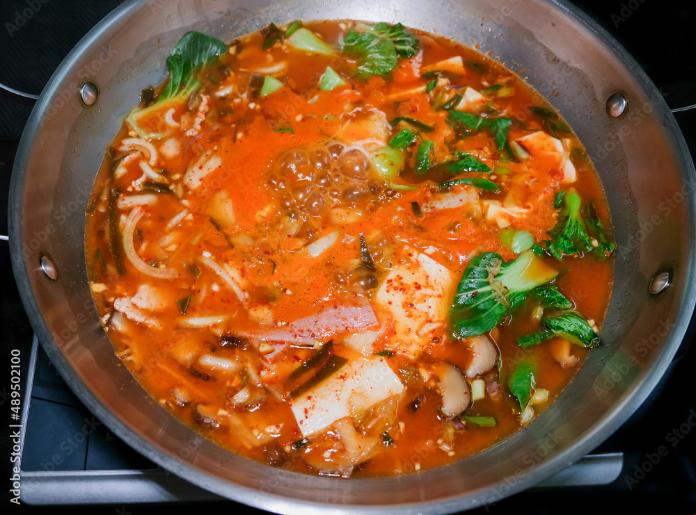 Delicious homemade Korean gourmet. Budae jjigae aka Army Stew with ...