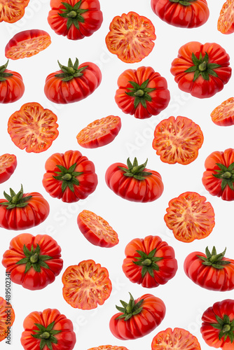 Fototapeta Naklejka Na Ścianę i Meble -  Red Tomato on a wallpaper background