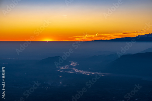 Fototapeta Naklejka Na Ścianę i Meble -  Winter sunset from an alpine peak of Friuli-Venezia Giulia