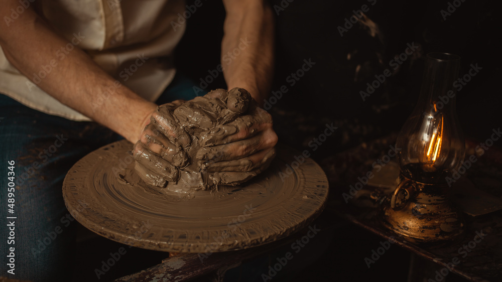 man makes Plate in pottery workshop, clay product, authentic atmosphere, background, footage. Lifestyle, indoor, cinema. Macro, close-up, hands. dirt man makes Plate in pottery workshop, clay product, authentic atmosphere, background, footage. Lifestyle, indoor, cinema. Macro, close-up, hands. dirt