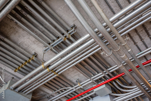 Electrical metal conduit installation in the building photo