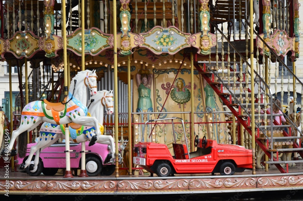 View of the Eiffel Tower with carousel beside, Paris, France View of the Eiffel Tower with carousel beside, Paris, France