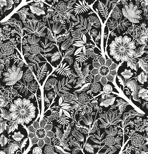 Seamless pattern with stylized ornamental flowers in retro, vintage style. Black and white graphics. Vector illustration.