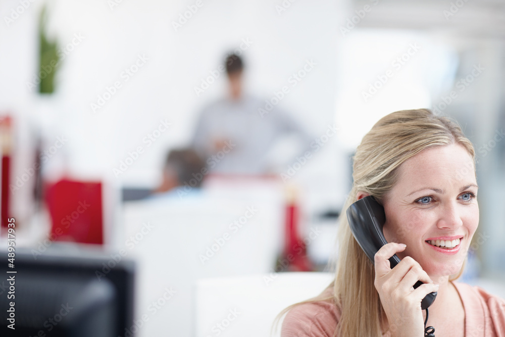 Pretty professional surrounded by copyspace. A female professional having a conversation on the phone alongside an impressive amount of copyspace. Pretty professional surrounded by copyspace. A female professional having a conversation on the phone alongside an impressive amount of copyspace.