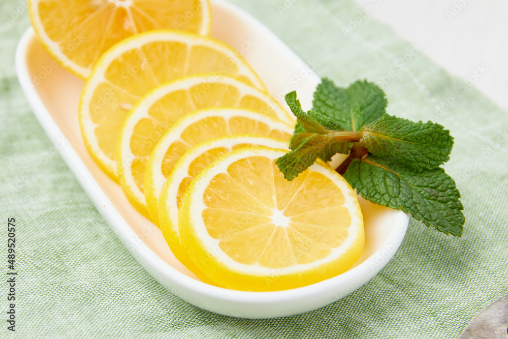 Lemons on a white wooden table Lemons on a white wooden table