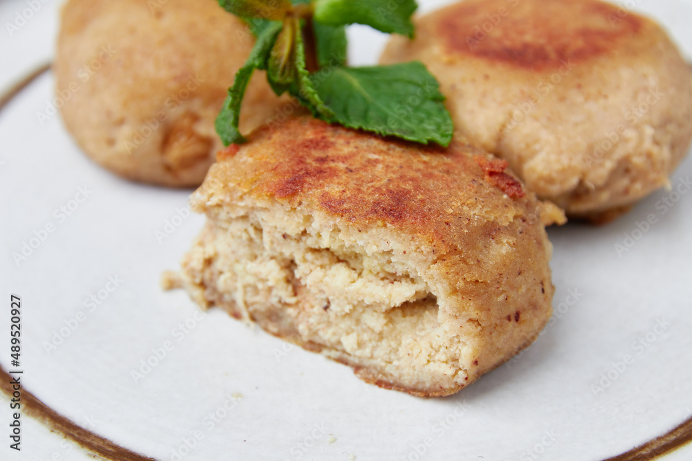 Raw tofu cutlets prepared to be baked or fried, vegan food