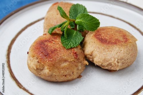 Raw tofu cutlets prepared to be baked or fried, vegan food