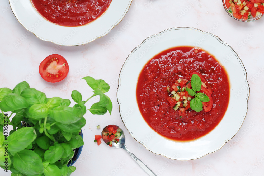 Plates with traditional gazpacho tomato soup Plates with traditional gazpacho tomato soup