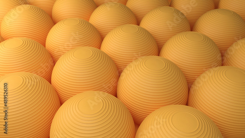 3D Render : Group of orange yoga balls composed as a 3d wallpaper or 3d background. An array of colorful balls placed together