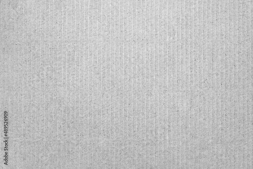 Paper texture with small spots and scratches.