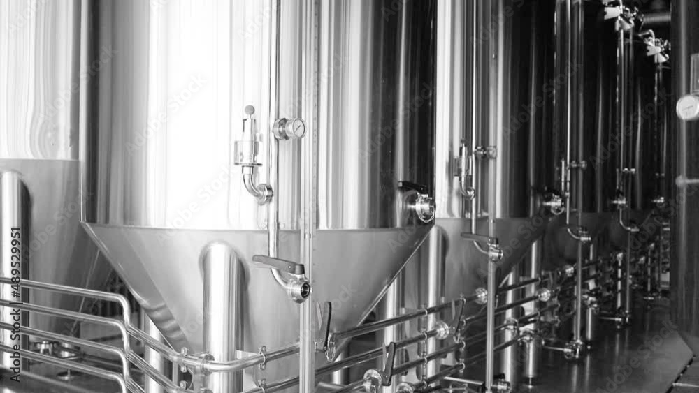 Craft beer production line in private microbrewery. Modern beer plant
