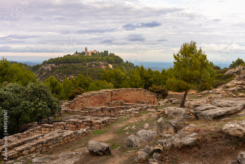 Ermitage San Cristobal and ancient ruins of an Iberian settlement on a hill close to Calaceite, Teruel, Aragon, Spain