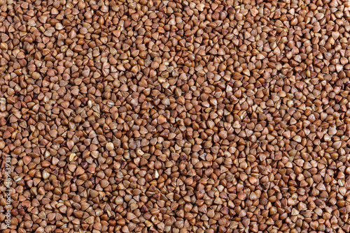 Buckwheat piles premium buckwheat groats. buckwheat groats texture.