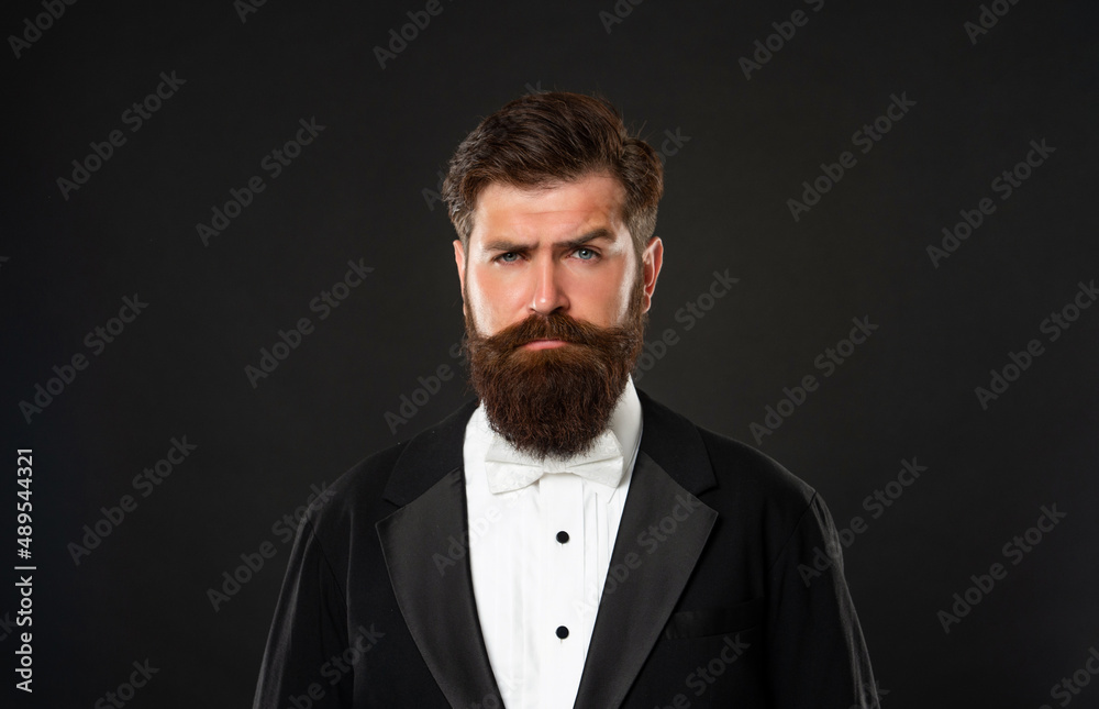 bearded man in tuxedo on black background, fashionist bearded man in tuxedo on black background, fashionist