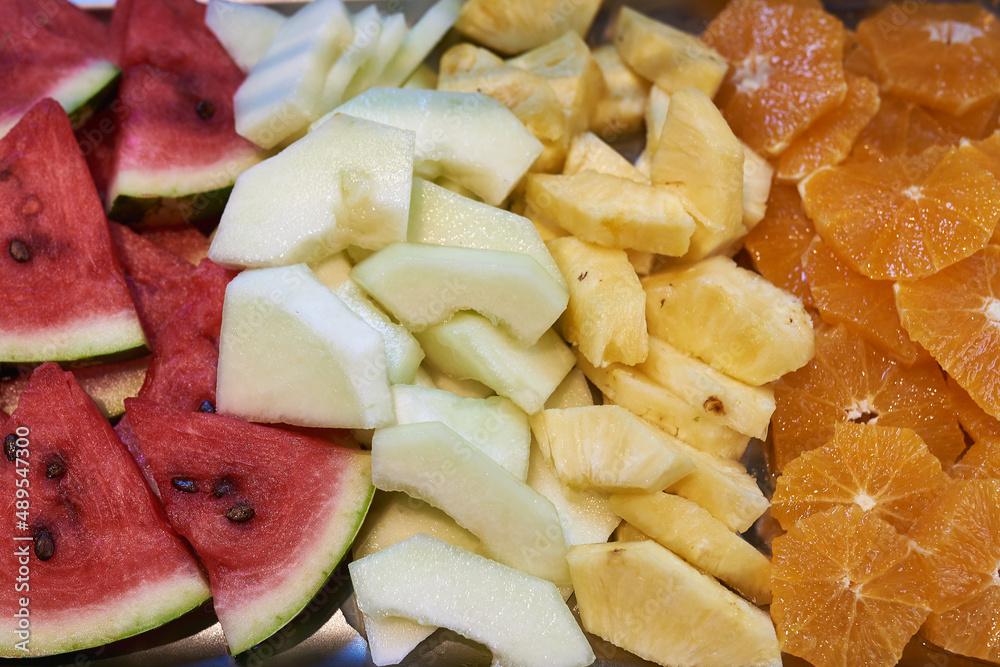 fresh, sliced fruit - watermelon, mango, pineapple, orange