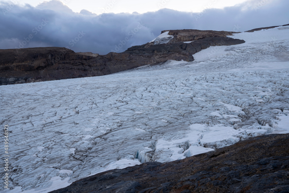 Alpine landscape. View of Tronador hill and Castaño Overo glacier ice field at sunrise in the Andes cordillera, Patagonia Argentina. Alpine landscape. View of Tronador hill and Castaño Overo glacier ice field at sunrise in the Andes cordillera, Patagonia Argentina.