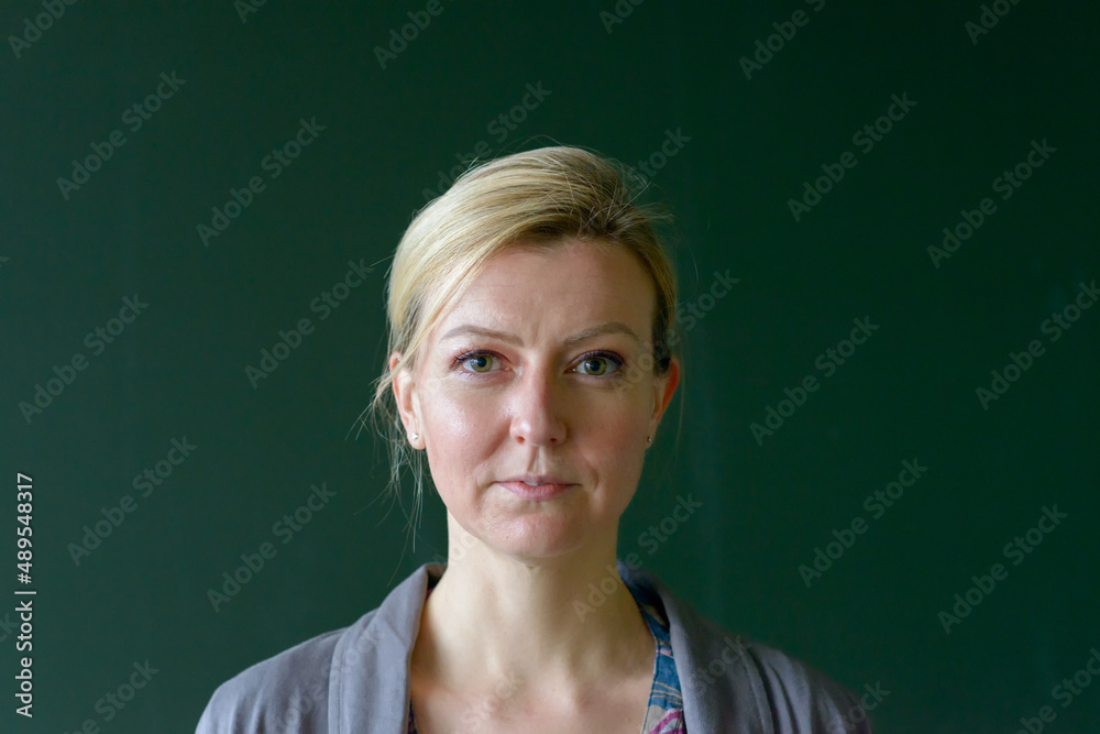 Attractive blond teacher staring at the camera Attractive blond teacher staring at the camera