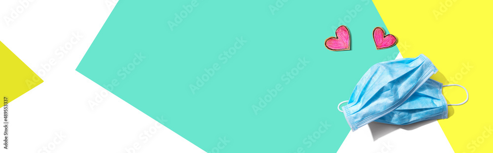 Medical worker appreciation theme with hearts and face mask - flat lay